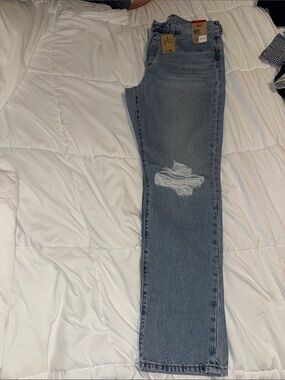 Levi's Straight Leg Jeans in Light Blue with Knee Distress